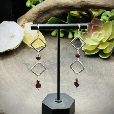 Two Geometric Diamond Shaped Round Earrings with Garnets