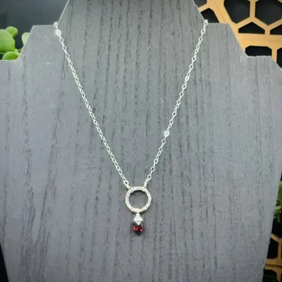 Small Fine Silver Round with Garnet Teardrop